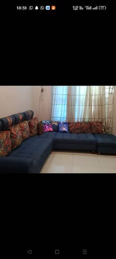 blue L shaped sofas 7 seater. . . . . . one dewan