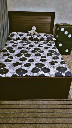 wooden single bed