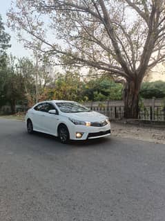Toyota Altis Grande manual with sunroof 2014