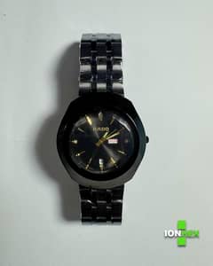 RADO Black Steel Strap Watch – where strength meets style.