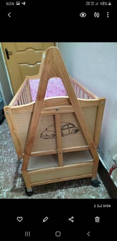 Wooden baby cot swing