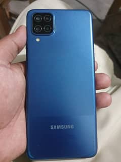 samsung A12. . . 4/128 with box and charger