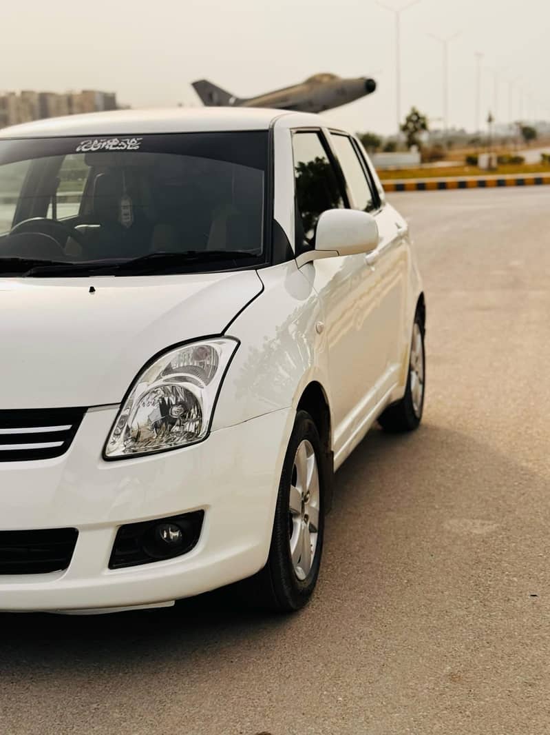 Suzuki Swift 1.3 DLX Total Genuine 2