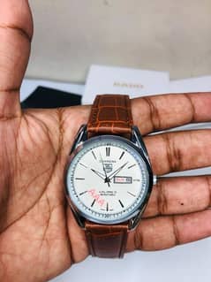 Tag Heuer Carrera 5 date and Day Both shown With Luxury Dail