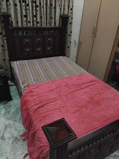 2 Single beds with 1 mattress and 1 side table