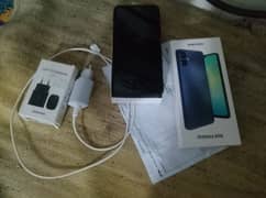 Samsung a06(4+64) + charger + Cover