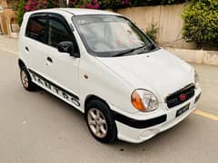 An antique piece santro power windows,power steering in lush condition