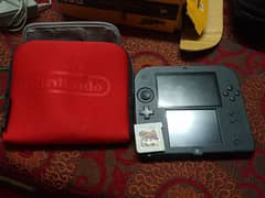 Nintendo 2DS with Super Mario 3D land cartridge