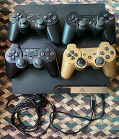 PlayStation 3 Jailbreak along with 4 controllers and 8 CD Games.