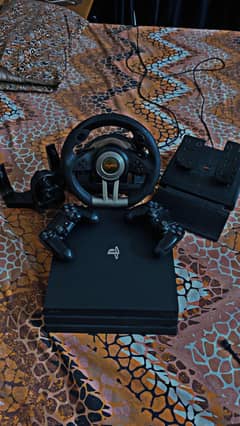 PS4 PRO, PXN V3 PRO AND NFS HEAT SET.