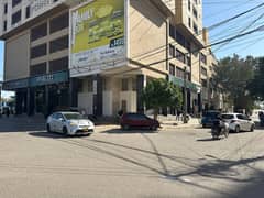 CORNOR SHOWROOM AT MAIN SHAEED E MILLAT ROAD WITH 2000 SQ FT BASMENENT