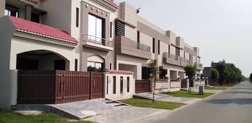 Sasta plot 130 feet road par, DHA Phase 10 k sath Grand Avenue mein