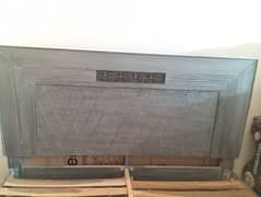 wooden bed with mattress