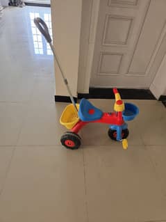 Tricycle with handle