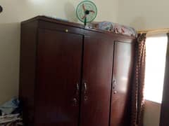 Home furniture a king sized bed ,a cupboard,divider and a dresser