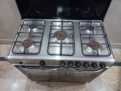 5 burnel cooking range . steemer and microwave