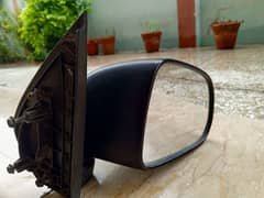 Suzuki Alto driving side mirror.