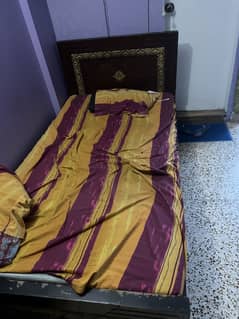 Wooden bed with table