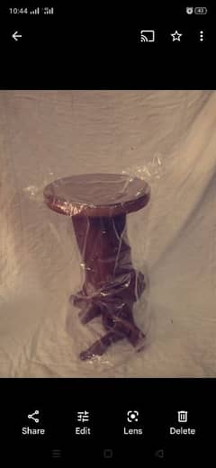 it is a antique table of fish bowl aquarium
