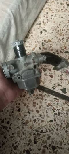 Honda 125 carburetor