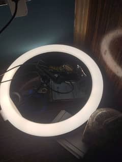 Ring light and Tripod with extra accessories