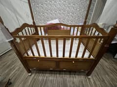 Baby wooden cot with swing