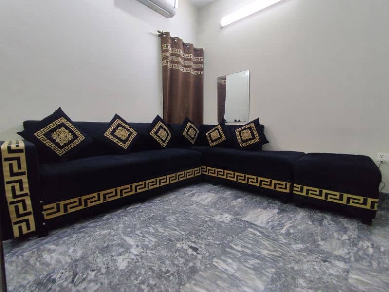 Almost new L shape sofa 0