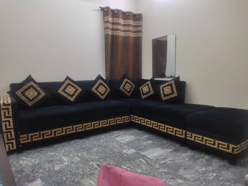 Almost new L shape sofa 1