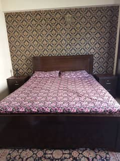 bed with side tables