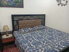 king bed with mattress and dressing plus side table