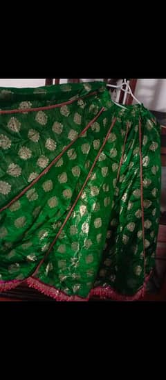green lehnga with shoking pink shirt