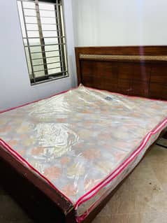 solid wood bed with mattress with one with table