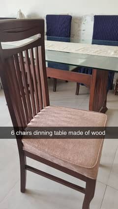 Dinning table with wooden chairs