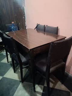 Wooden Dining table with 6 chairs