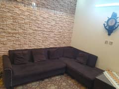 L shape sofa in dark brown color