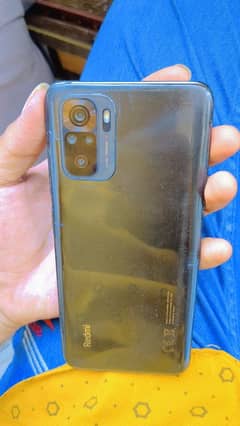 Redmi note 10 4/128 box charger sirf glass change ha Baki all ok ha
