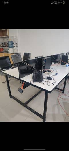 call center workers table for computer and laptop