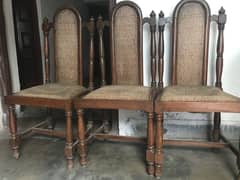 Used wooden table with 6 chairs