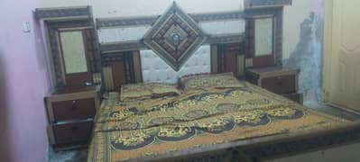 bed with 2 side table , dressing, and wardrobe for sell