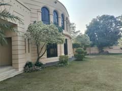 2000 Sqyd Beautiful Build House 12 Bed Drawing ,Dining 3 TV Lounge 2 Kitchen Front Beautiful Huge Lawn Peaceful Location for sale