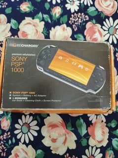 PSP 1000 GENUINE WITH ORIGINAL CHARGER AND SOME GAMES