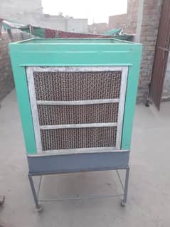 Room cooler and it's  stand in new condition available in price18000