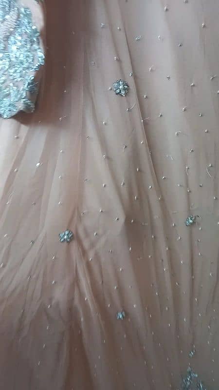 maxi net fabric color peach new condition  1 time by tariq 3 8