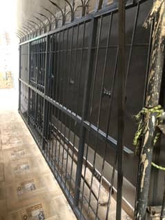 heavy guage iron grill/ jungla/ gate