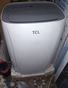 TCL portable Ac. .  1 ton with all accessories.