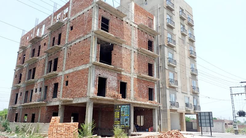 05 MARLA PLOT FOR SALE IN BLOCK E FACING PARK DIRECT APPROACH FROM MAIN BOULEVARD BUILDER LOCATION PLOT 12