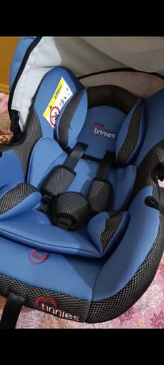 Tinnies car seat for sale