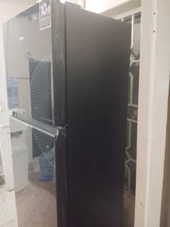 Haier 346 Medium size red and black fridge