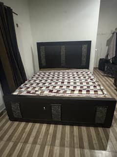 Double bed with mattress and dressing table