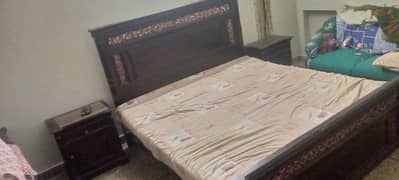 Double bed with side tables and dressing